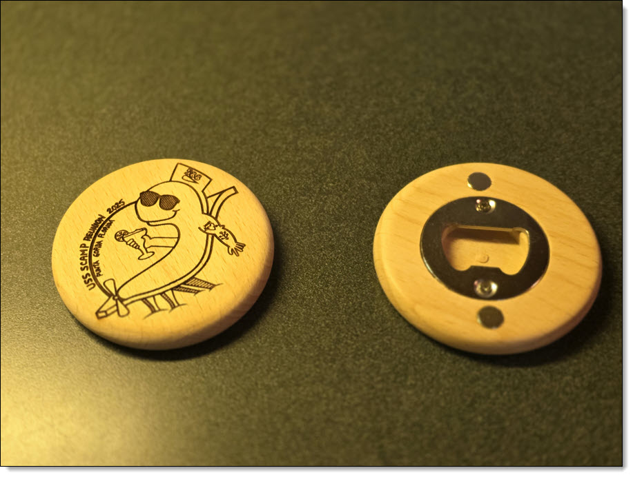 wooden coin-shaped bottle opener with USS Scamp 2025 Punta Gorda logo on one side.