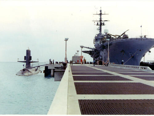Scamp moored across from the USS New Orleans in Okinawa. WestPac 1973